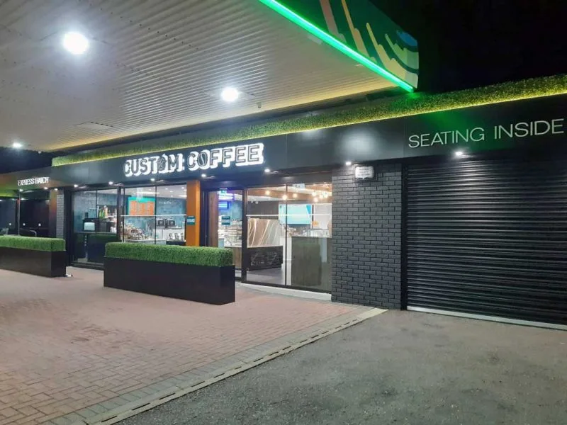 Bespoke aluminium shop front panel installation